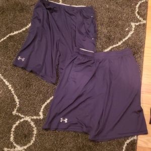 A pair of under armour navy blue shorts